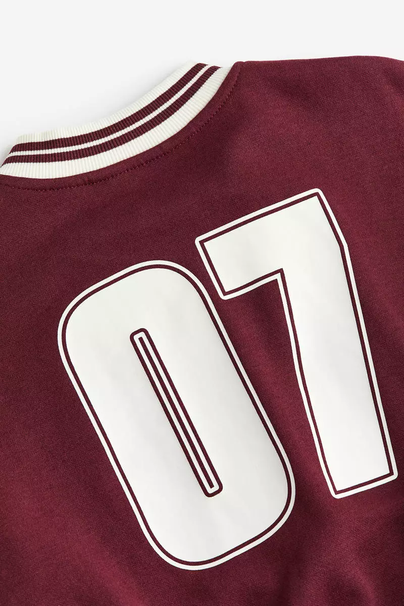 Print-motif baseball jacket