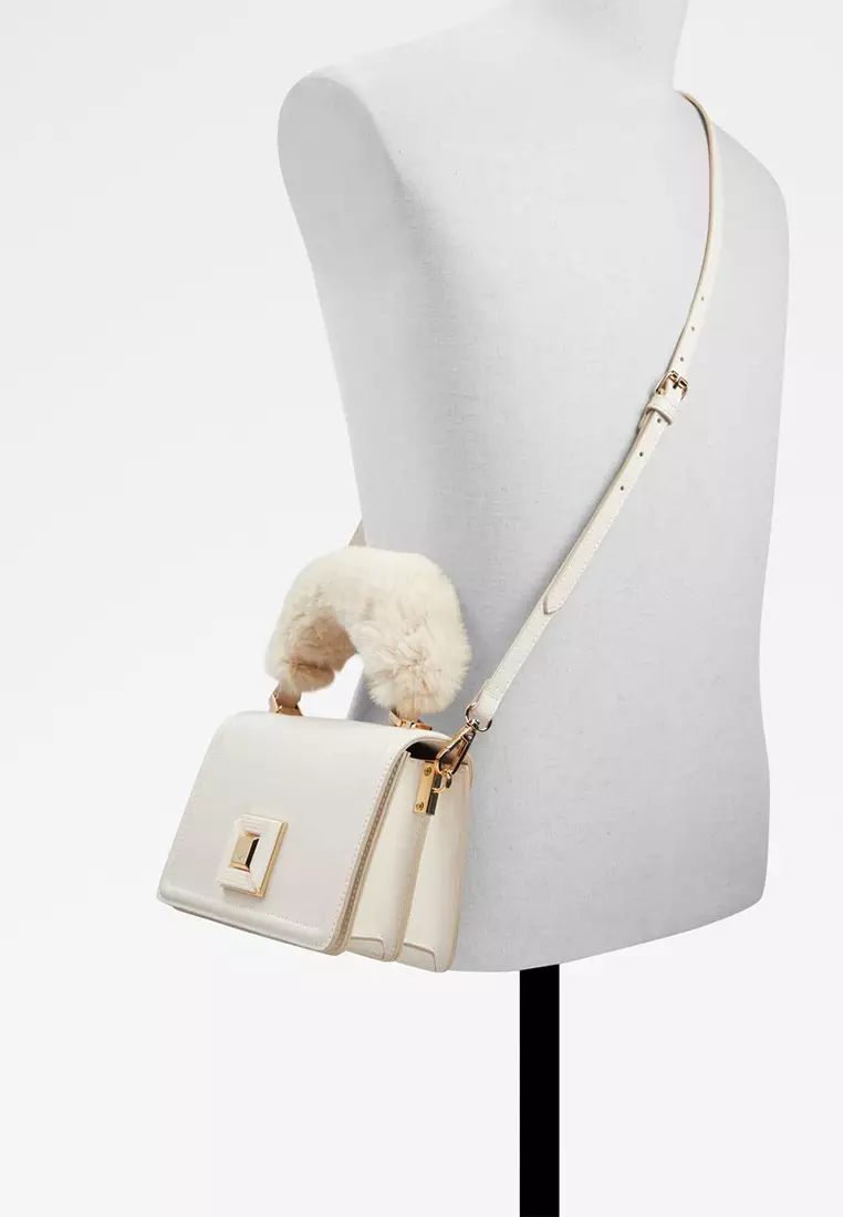 ALDO Notabena faux fur top handle bag with crossbody strap in bone