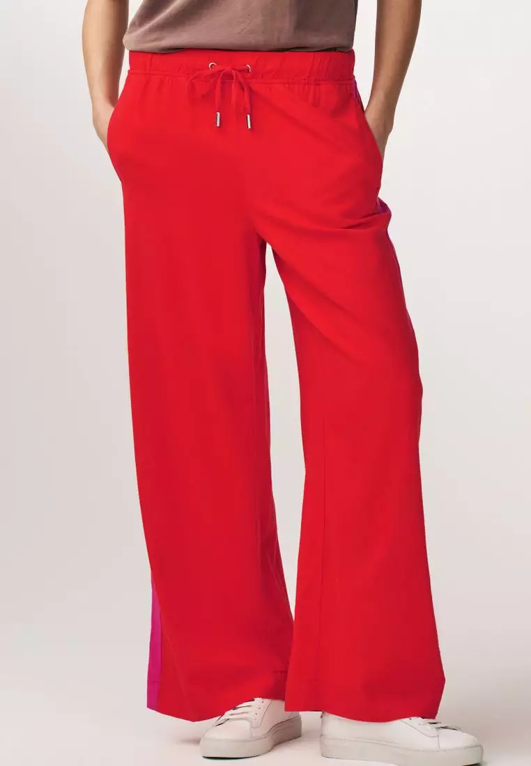 Red trousers website sale