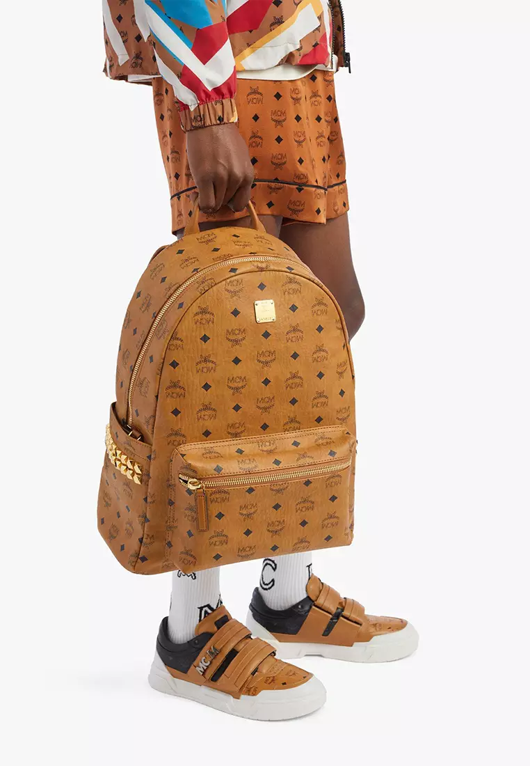 Mcm backpack small best sale medium