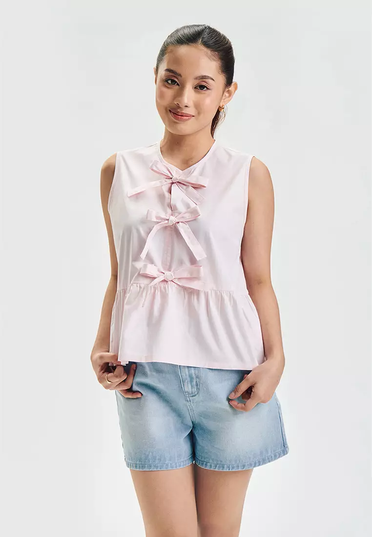 Sleeveless Peplum Top with Bows