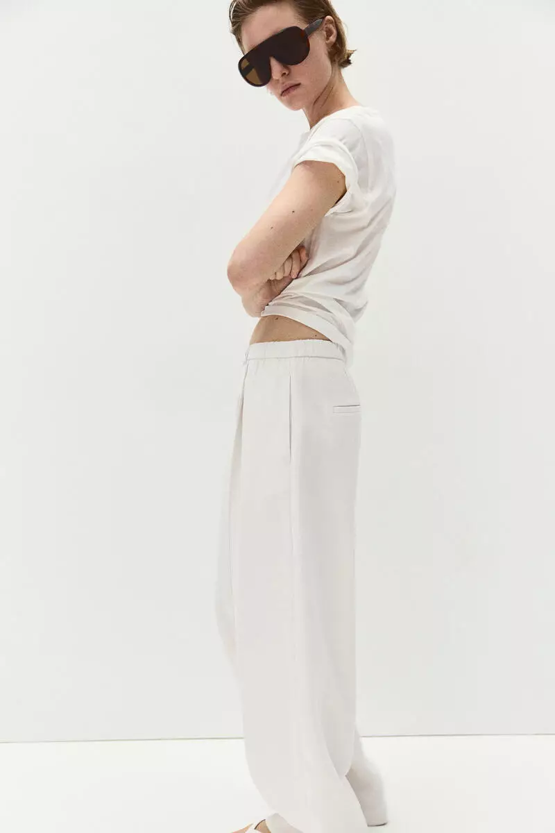 Crease-leg barrel trousers