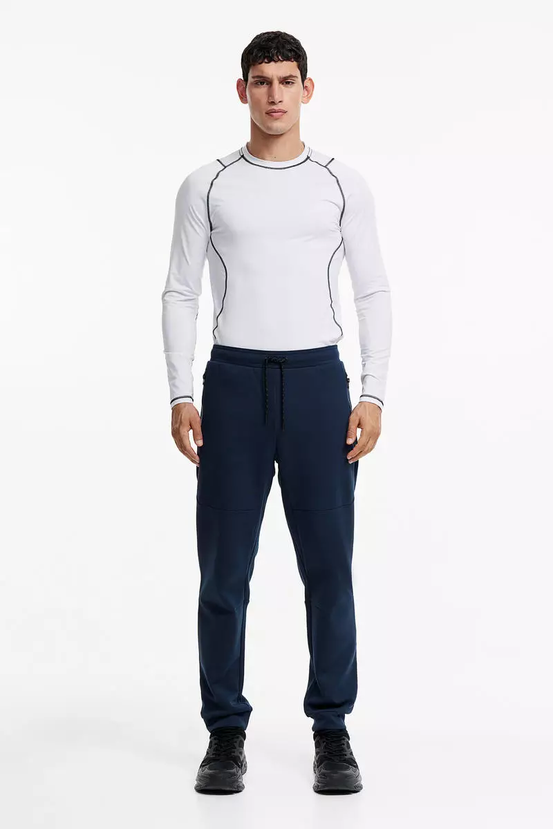 Buy H&M DryMove™ Tapered tech joggers with zipped pockets 2024
