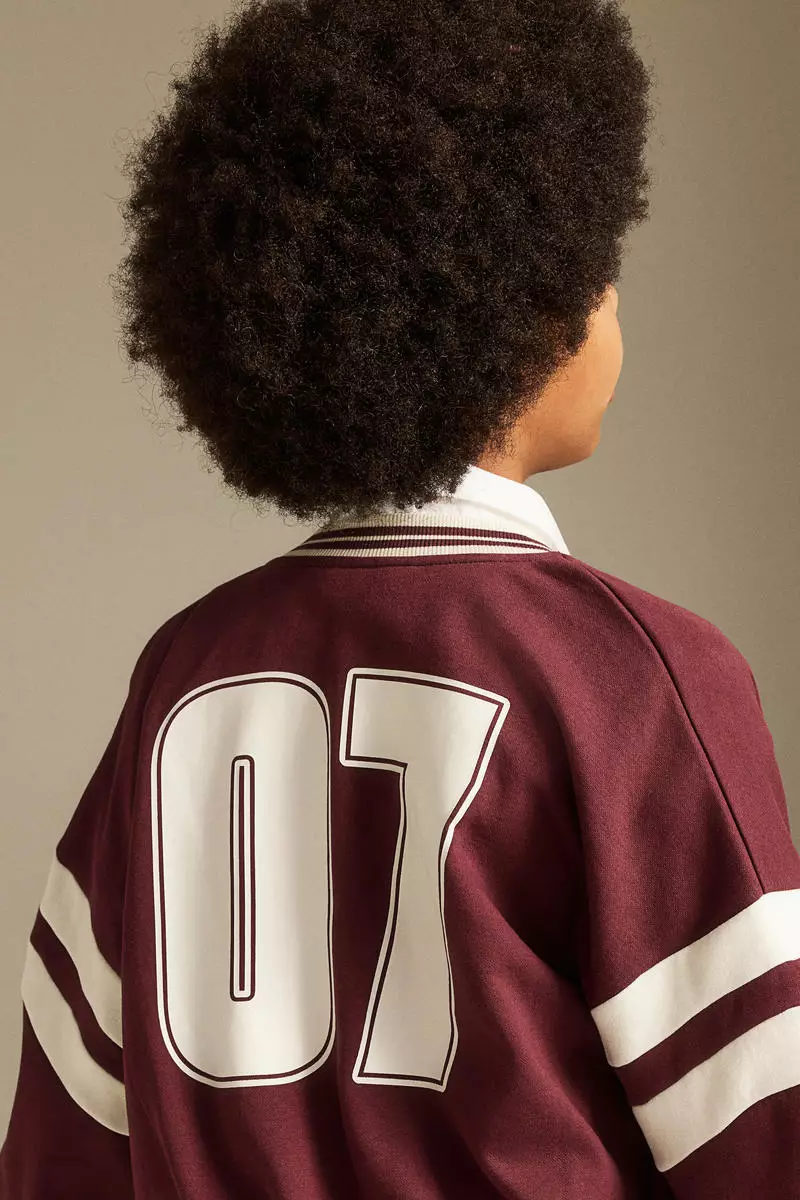 Print-motif baseball jacket