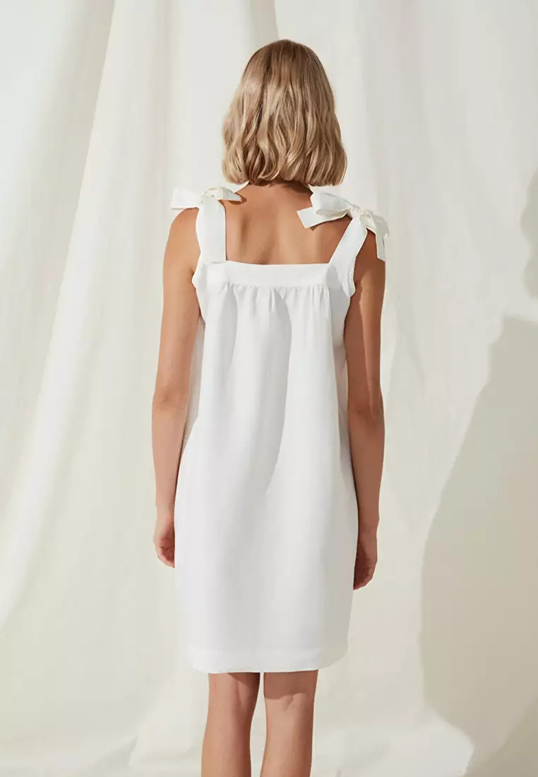 White linen sleeveless dress on sale