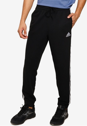 ADIDAS black essentials french terry tapered cuff 3-stripes pants 20686AAA2DD1C2GS_1