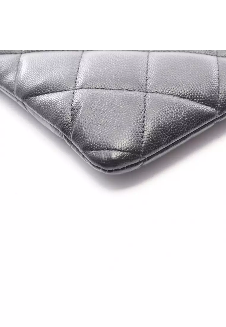 Pre-Loved Chanel matelasse Clutch bag Caviar skin black gold hardware