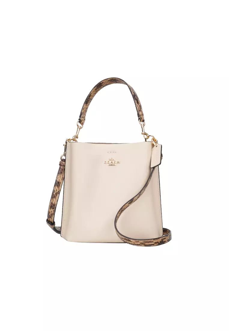 SOLD Coach Small Town Bucket Bag Dandelion Floral  Black leather handbags,  Beige handbags, Floral purse