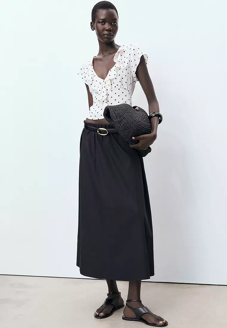 Polka-Dot Blouse With Ruffles