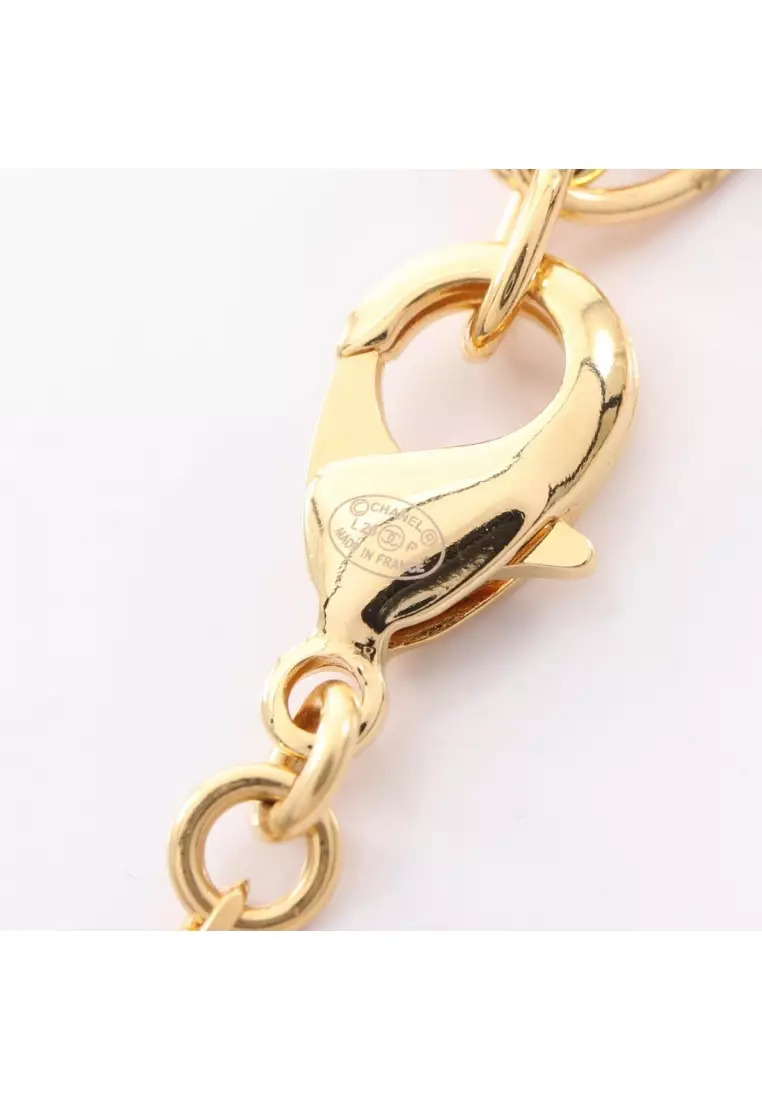 Pre-Loved Chanel coco mark horse riding necklace GP gold white black L26P