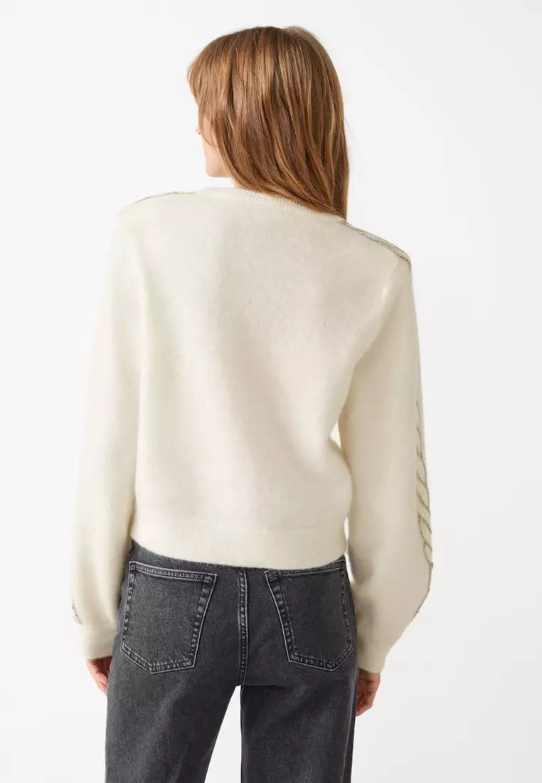 Structured shoulder outlet sweater