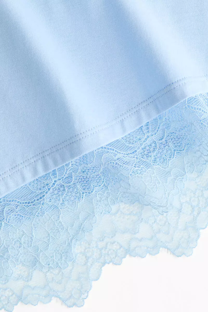 Asymmetric lace-trimmed T-shirt
