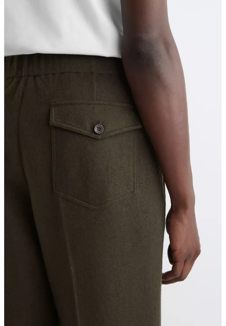 ELASTICATED BOILED-WOOL TROUSERS