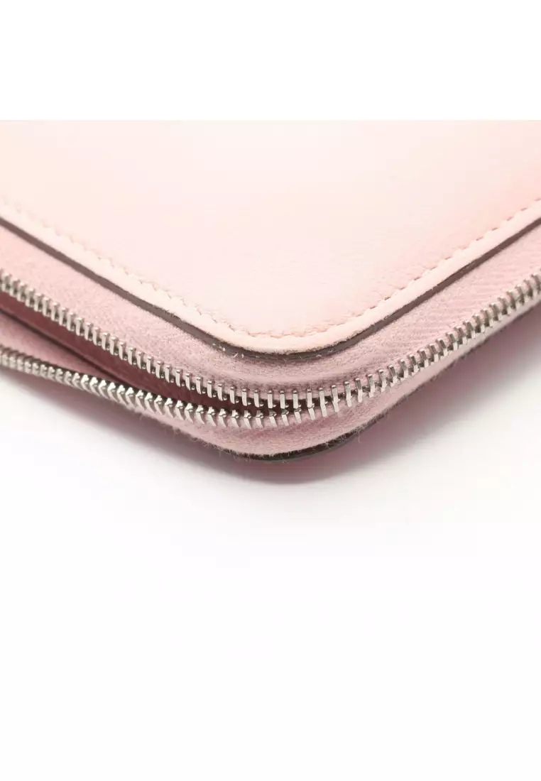 Pre-Loved Hermès Azap Long rose sakura round zipper long wallet Sikkim leather Light pink silver hardware T stamp