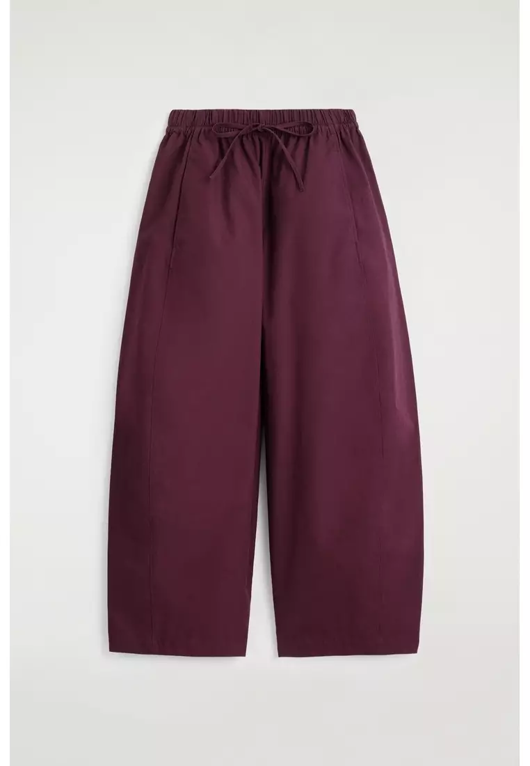ELASTICATED BARREL-LEG TROUSERS
