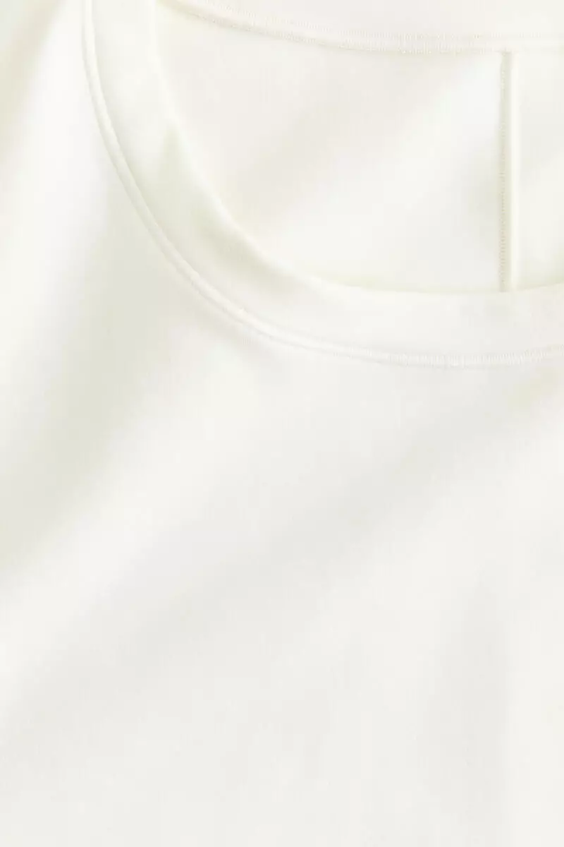 Slim Fit Long-sleeved sports top with SoftMove™