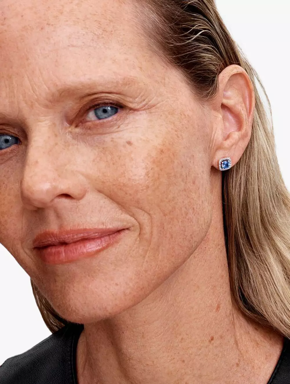 Sterling silver stud earrings with ocean blue crystal and clear cubic zirconia