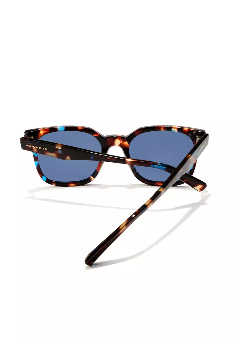 HAWKERS Teal Carey Blue TRIBE Sunglasses for Men and Women, Unisex. UV400 Protection. Official Product designed in Spain