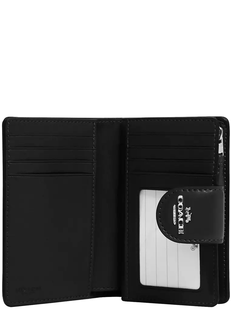 Buy Coach Coach Medium Corner Zip Wallet in Signature Canvas in