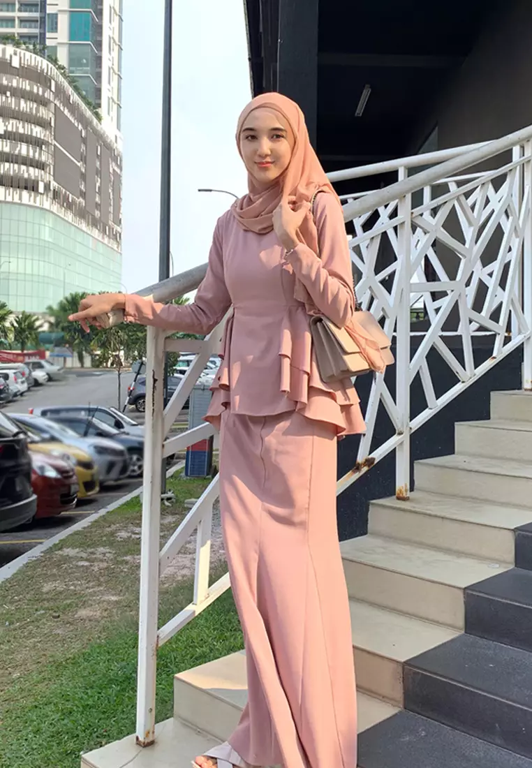 Lora Peplum in Peach Nude