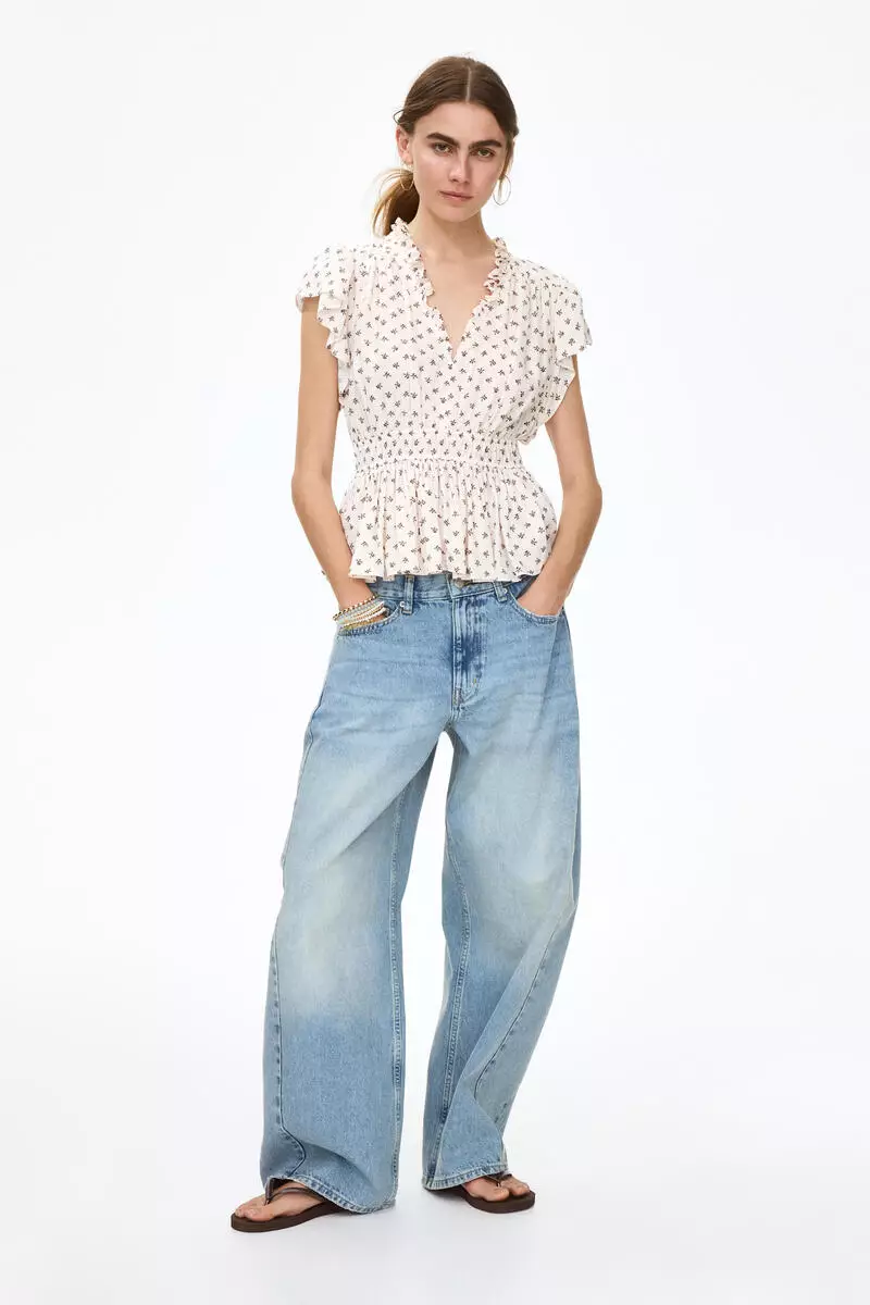 Flutter-sleeved peplum blouse
