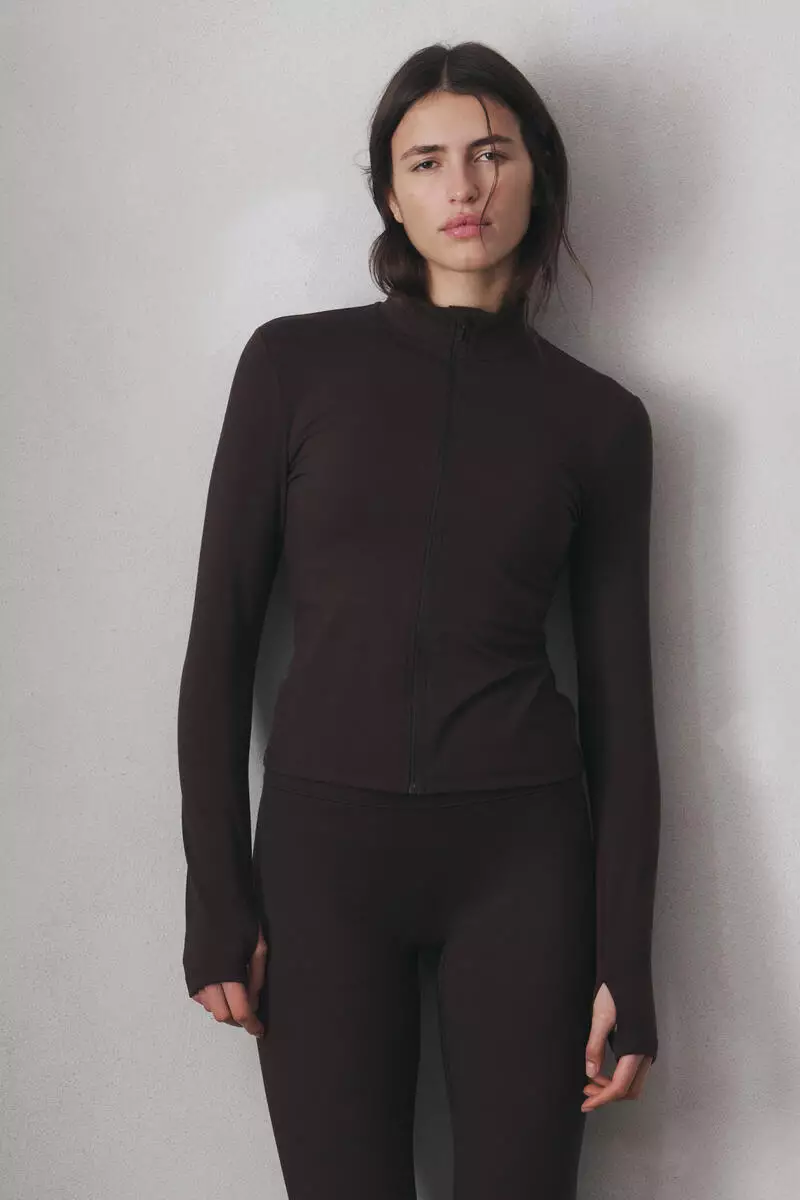 Zip-through sports jacket with SoftMove™