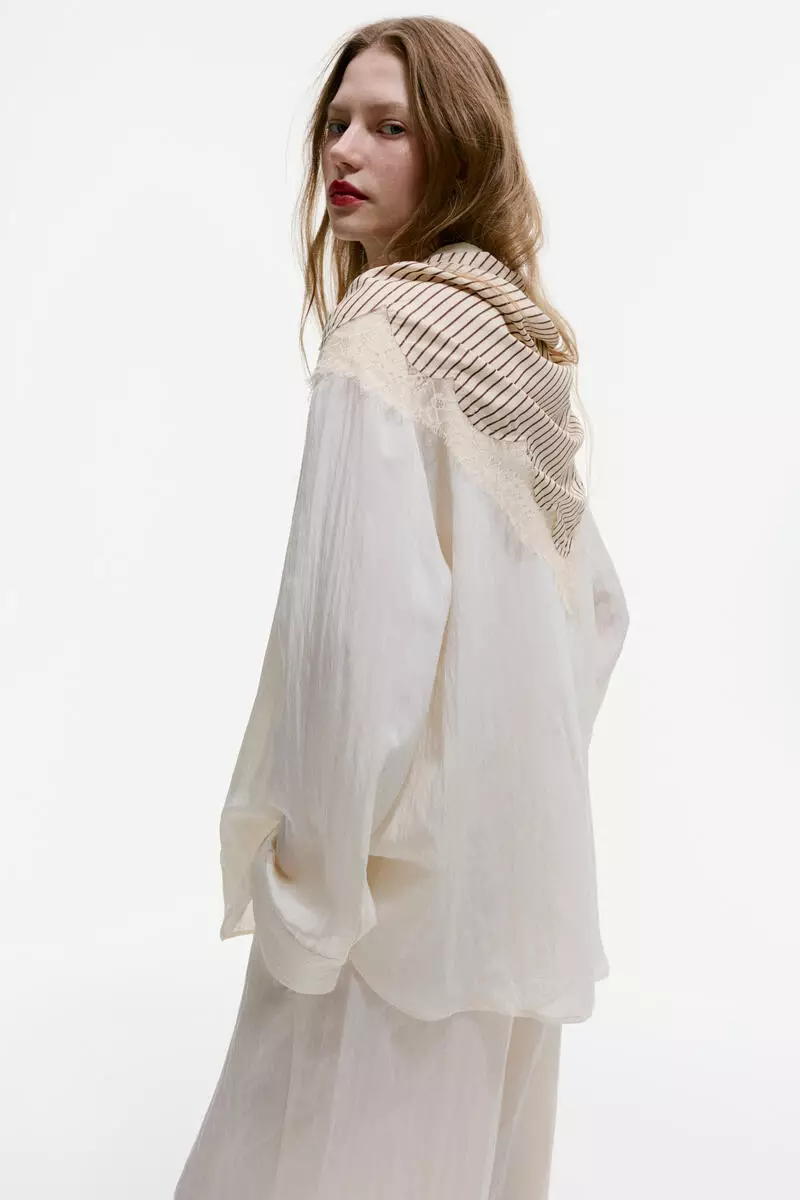 Lace-trimmed triangle scarf