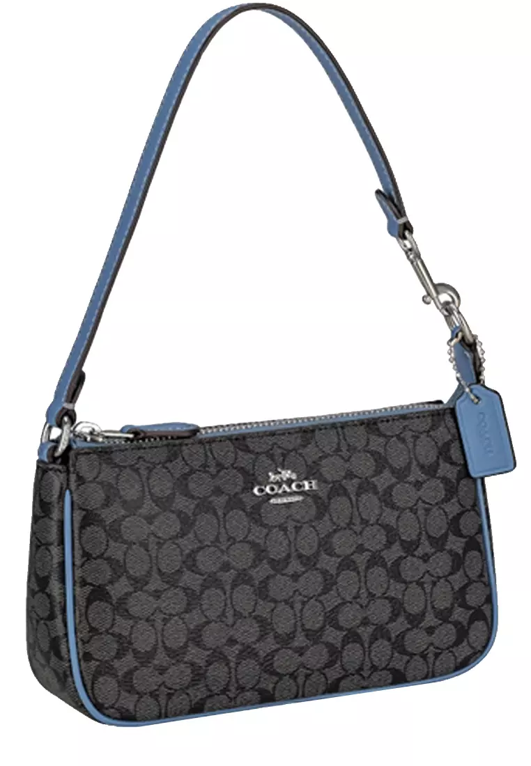 Top handle outlet pouch coach
