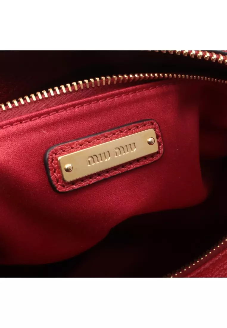 Pre-Loved MIU MIU MADRAS Madras Shoulder bag leather Red