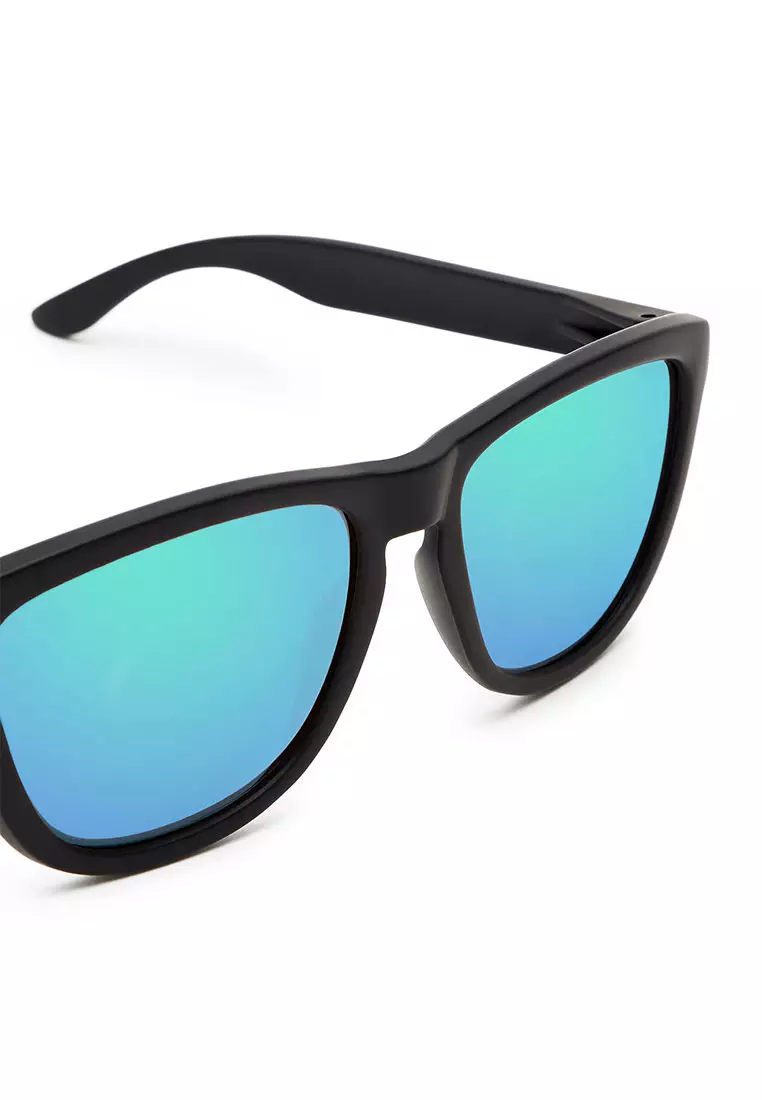 HAWKERS ONE Black Emerald Sunglasses for Men and Women. UV400 Protection. Designed in Spain