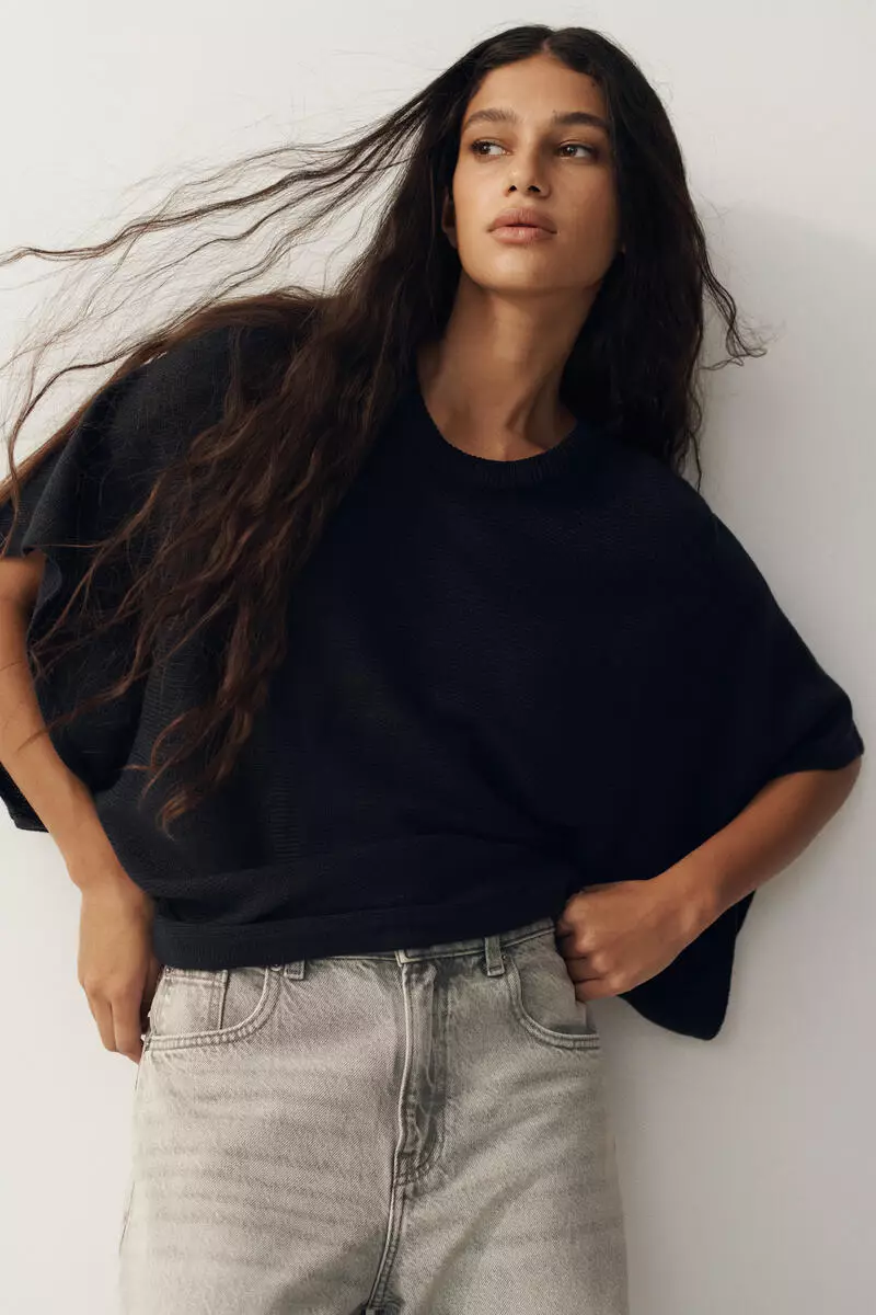 Batwing-sleeved knitted top