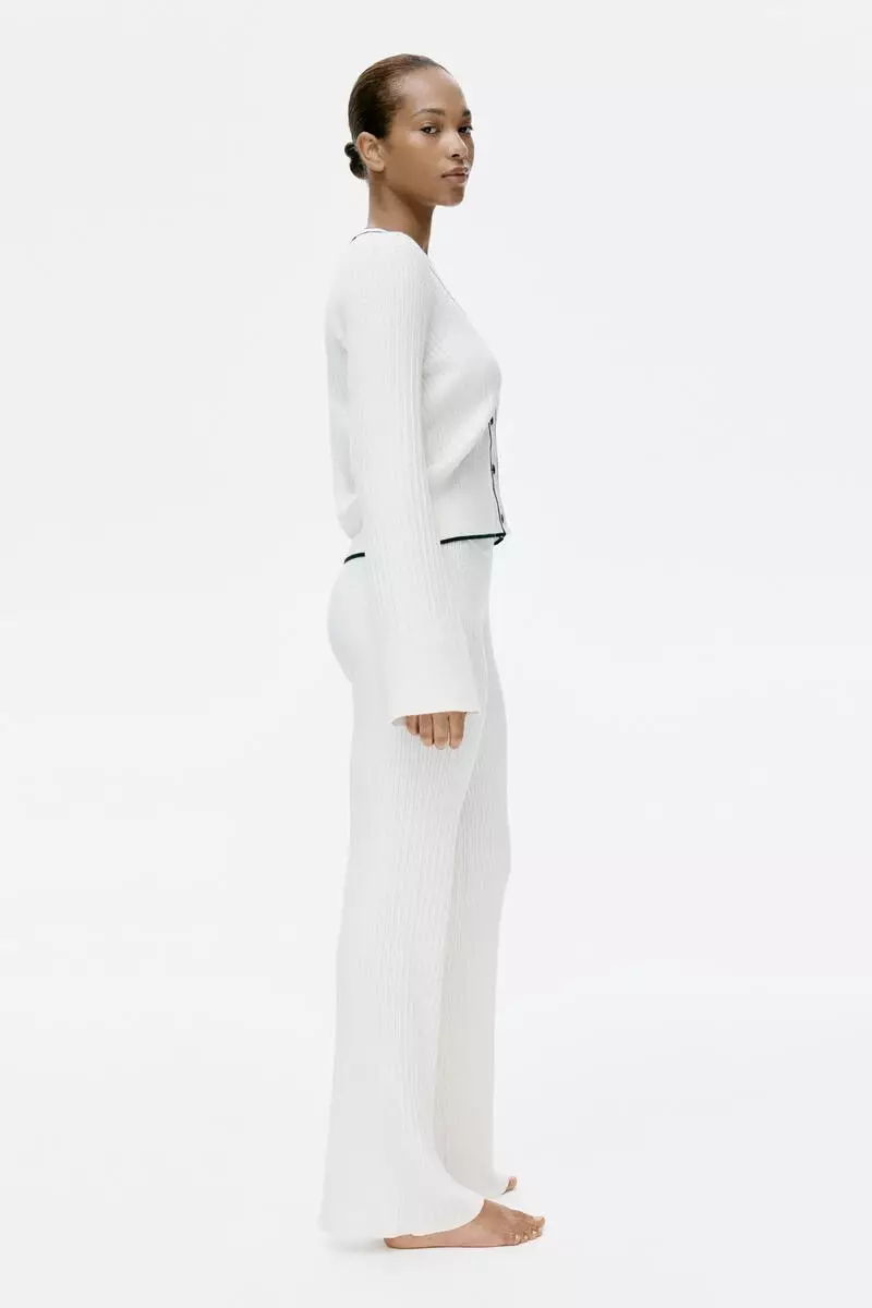 Flared cable-knit trousers