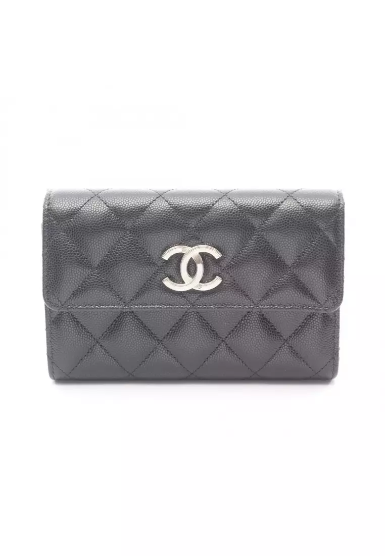 Pre-Loved Chanel matelasse trifold wallet Caviar skin black gold hardware