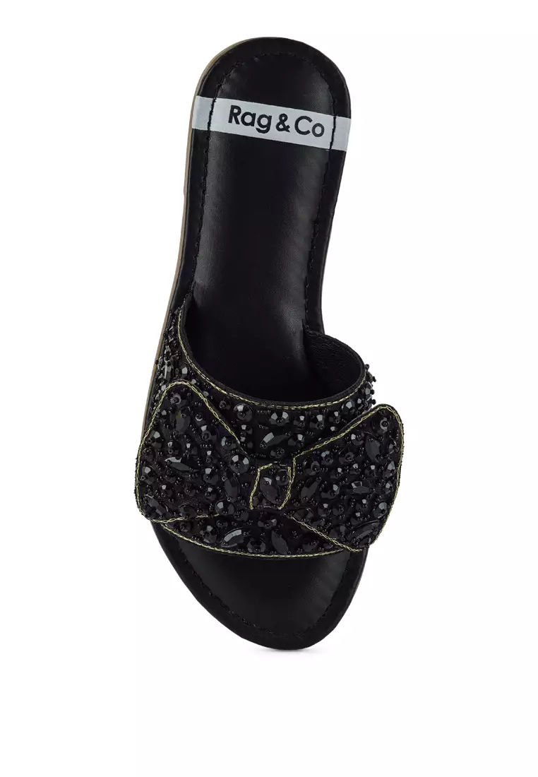 Sepatu Flat Berhias Pita Besar Warna Hitam