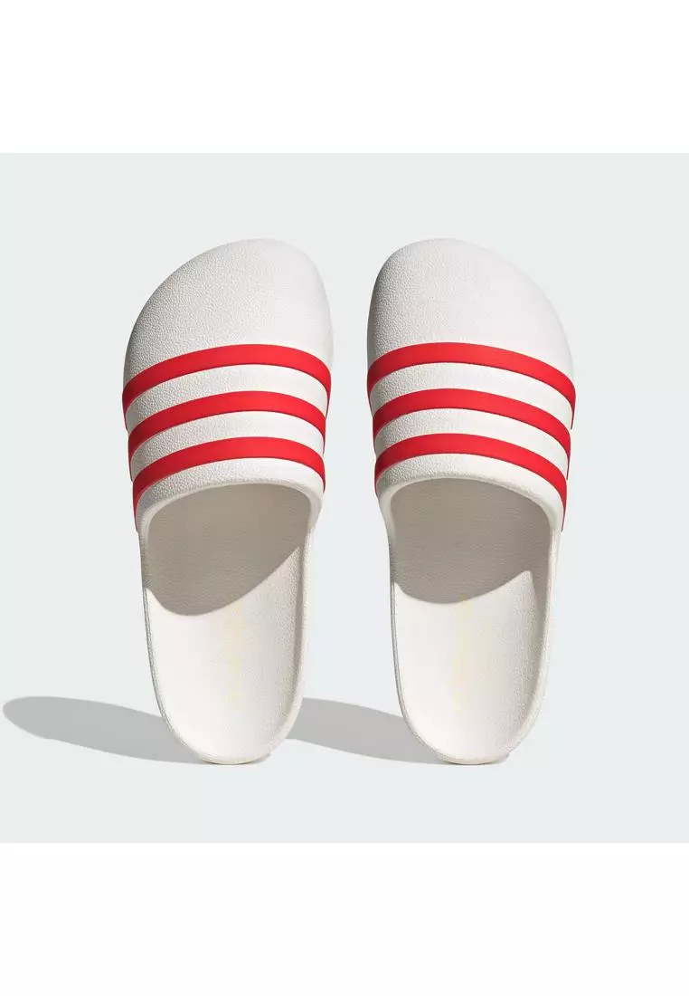 Red and top white adidas slides