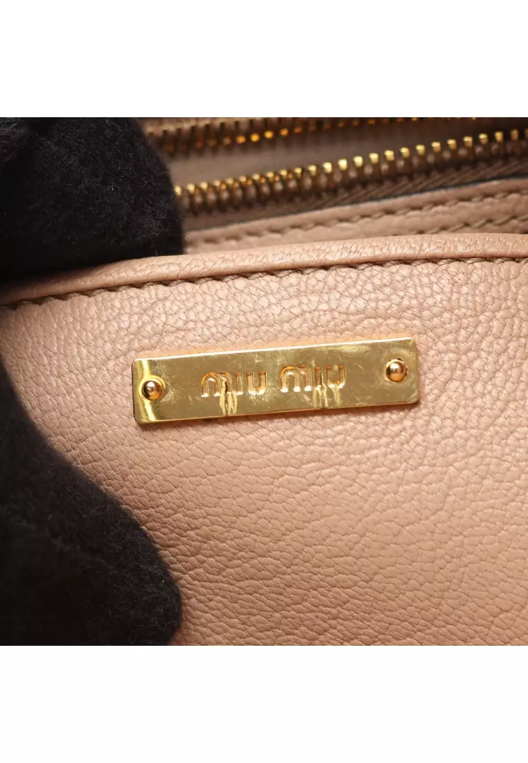 Pre-Loved MIU MIU MADRAS Madras Handbag leather beige 2WAY