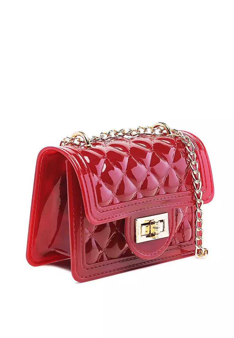 Red quilted leather handbag sale