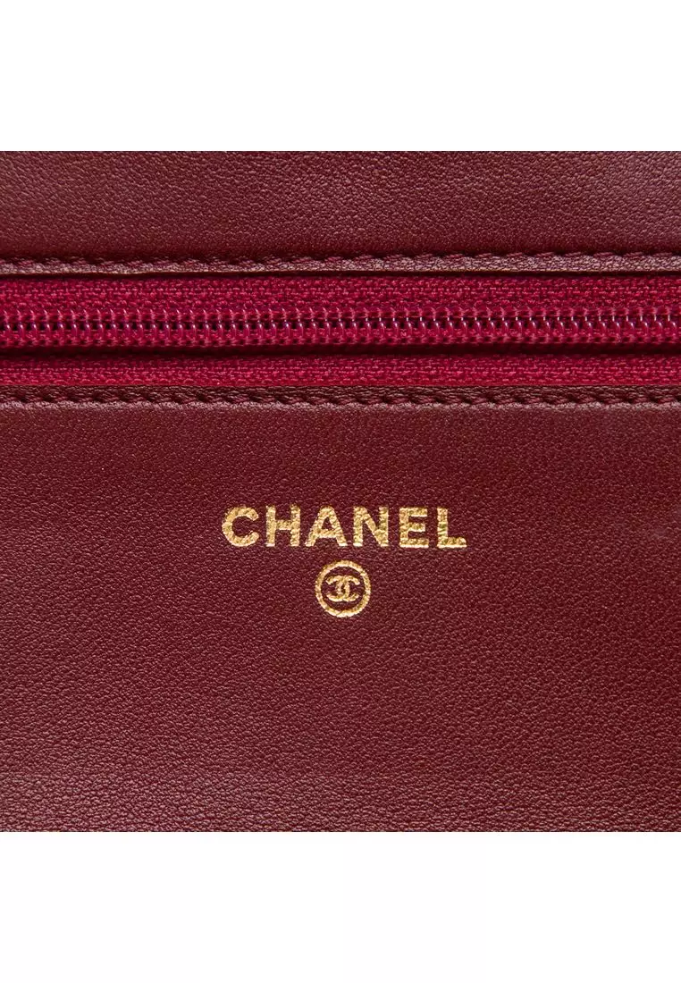 Pre-Loved Chanel Cc Embossed Calfskin Camellia Wallet On Chain