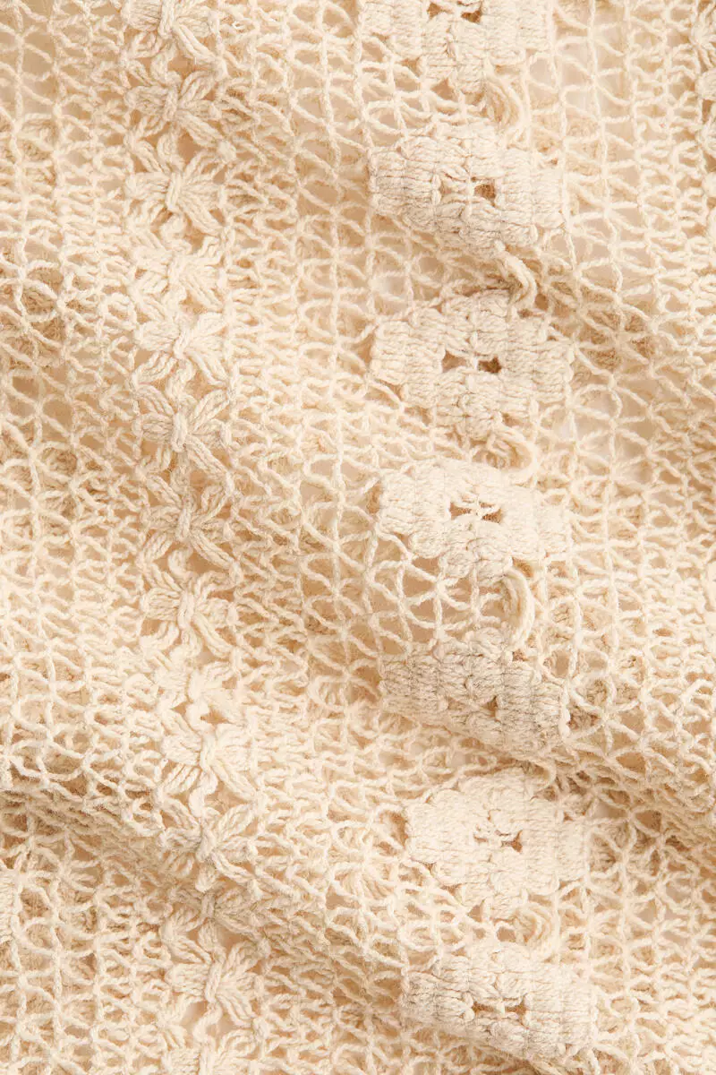 Frill-trimmed lace blouse