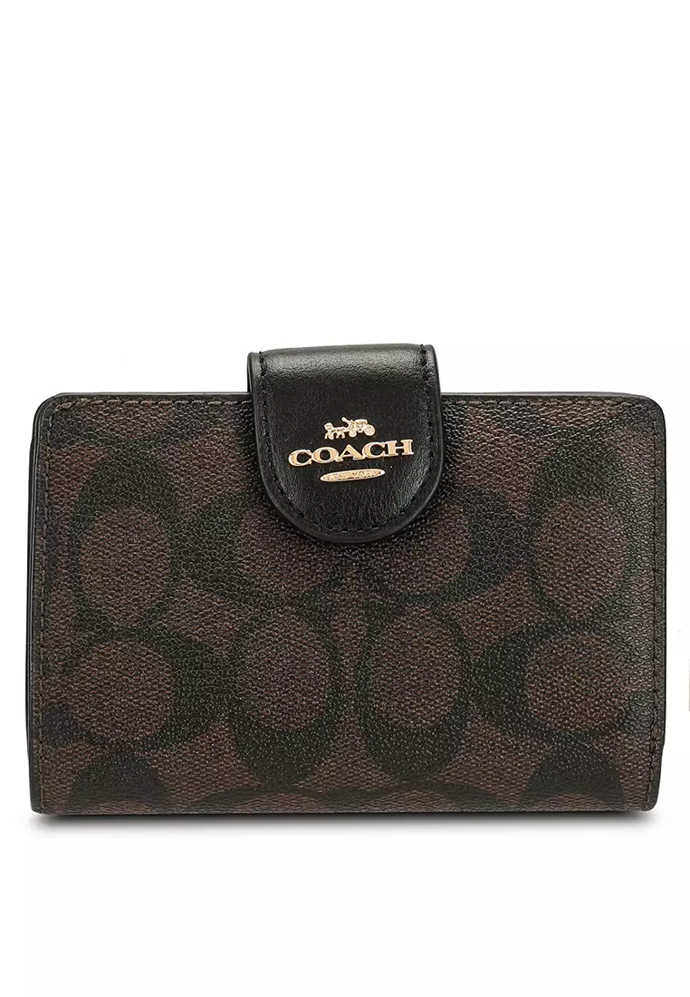 Buy COACH Coach Medium Corner Zip Wallet In Signature Canvas C0082