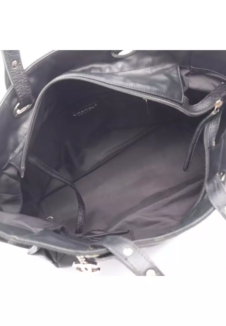 Pre-Loved Chanel Paris Biarritz GM Handbag tote bag Coated canvas leather black silver hardware