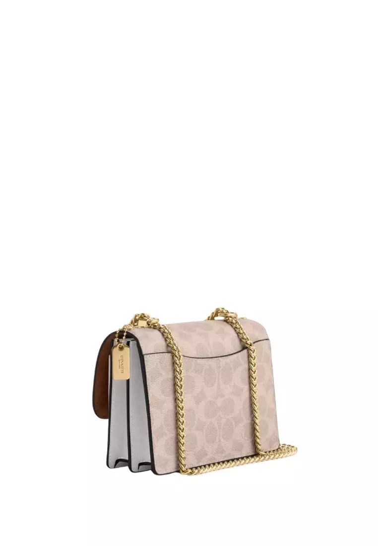 Mini Klare Crossbody Bag in Signature Canvas Gold Sand Chalk