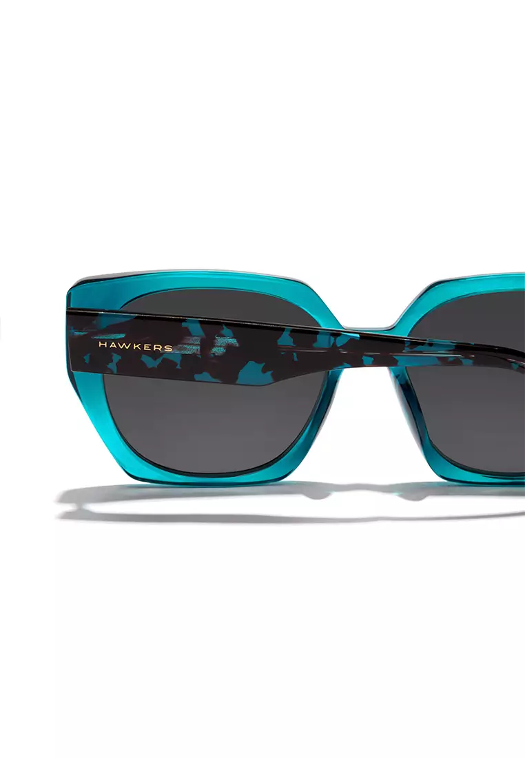 HAWKERS Blue Dark Eco Boujee Sunglasses For Women, Female. Official Product Designed In Spain