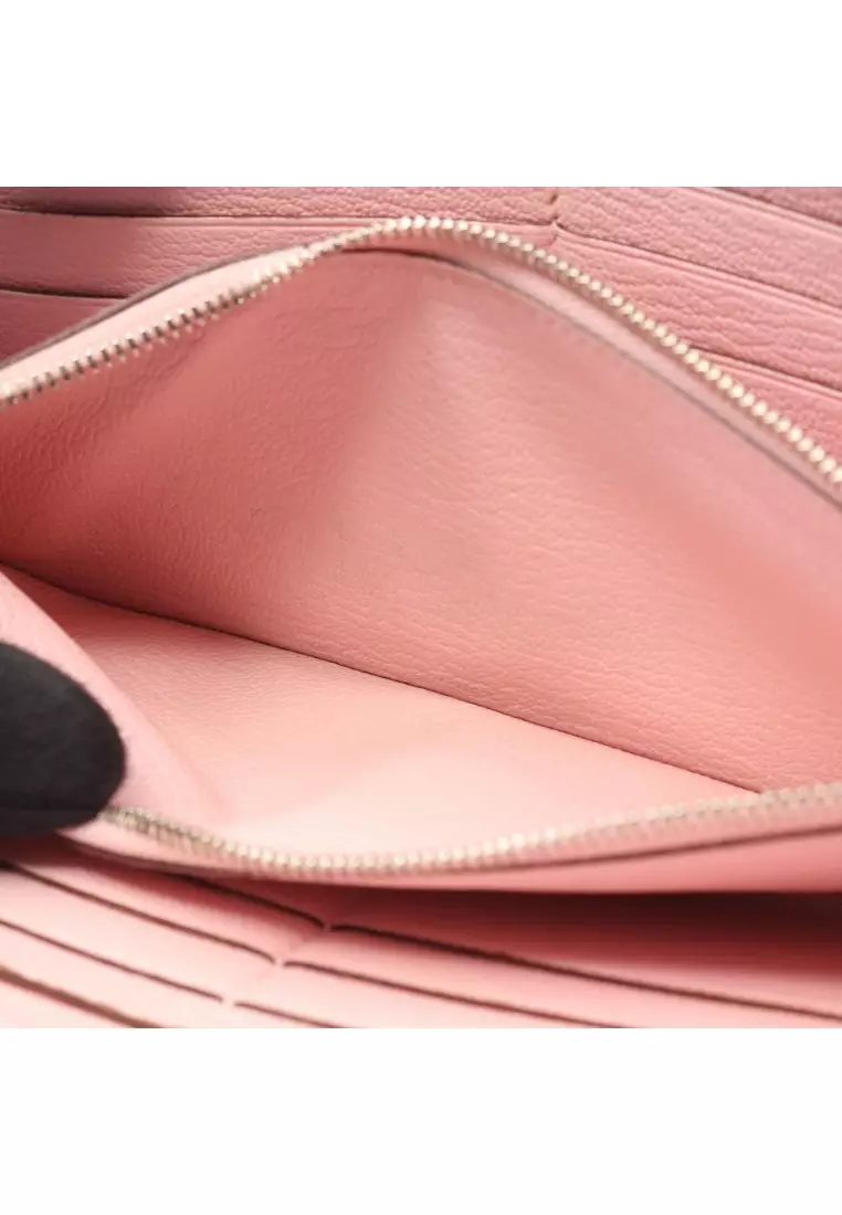 Pre-Loved Hermès Azap Long rose sakura round zipper long wallet Sikkim leather Light pink silver hardware T stamp