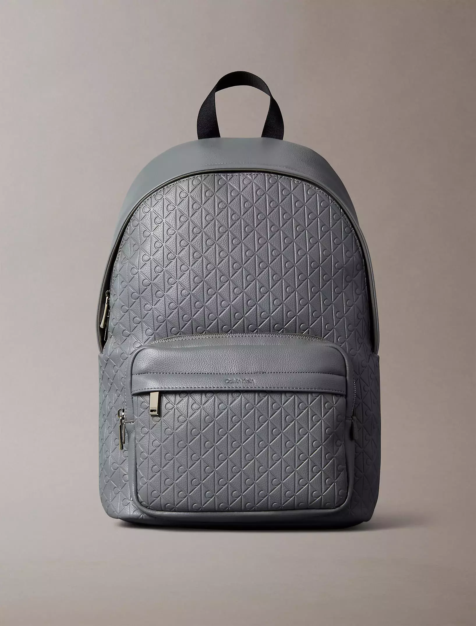 Calvin Klein - Calvin Klein Emblem AOP Embossed Round Backpack
