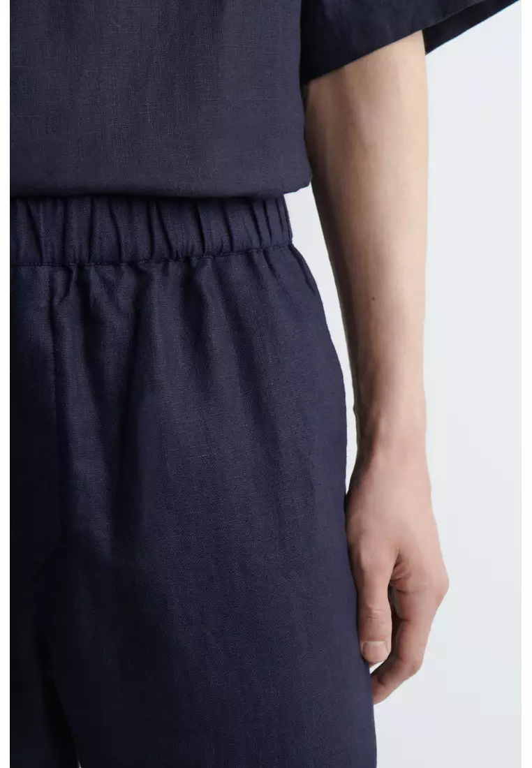 ELASTICATED LINEN REGULAR-FIT TAPERED TROUSERS
