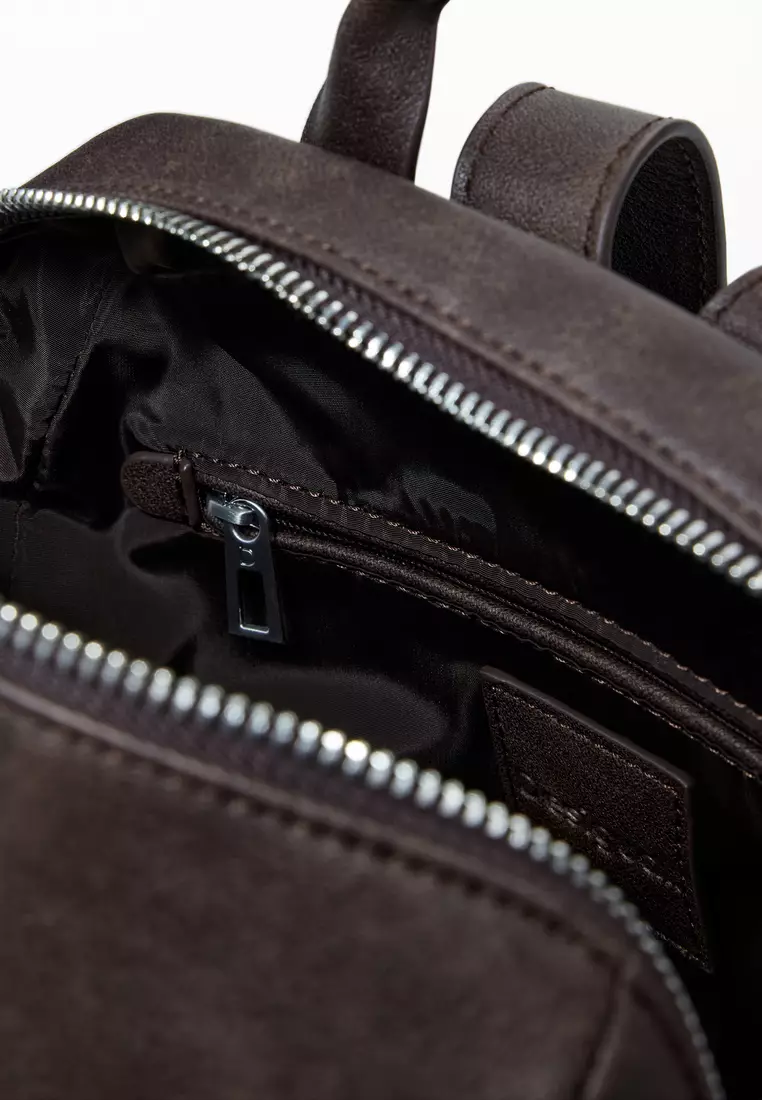 Small backpack with studded pockets