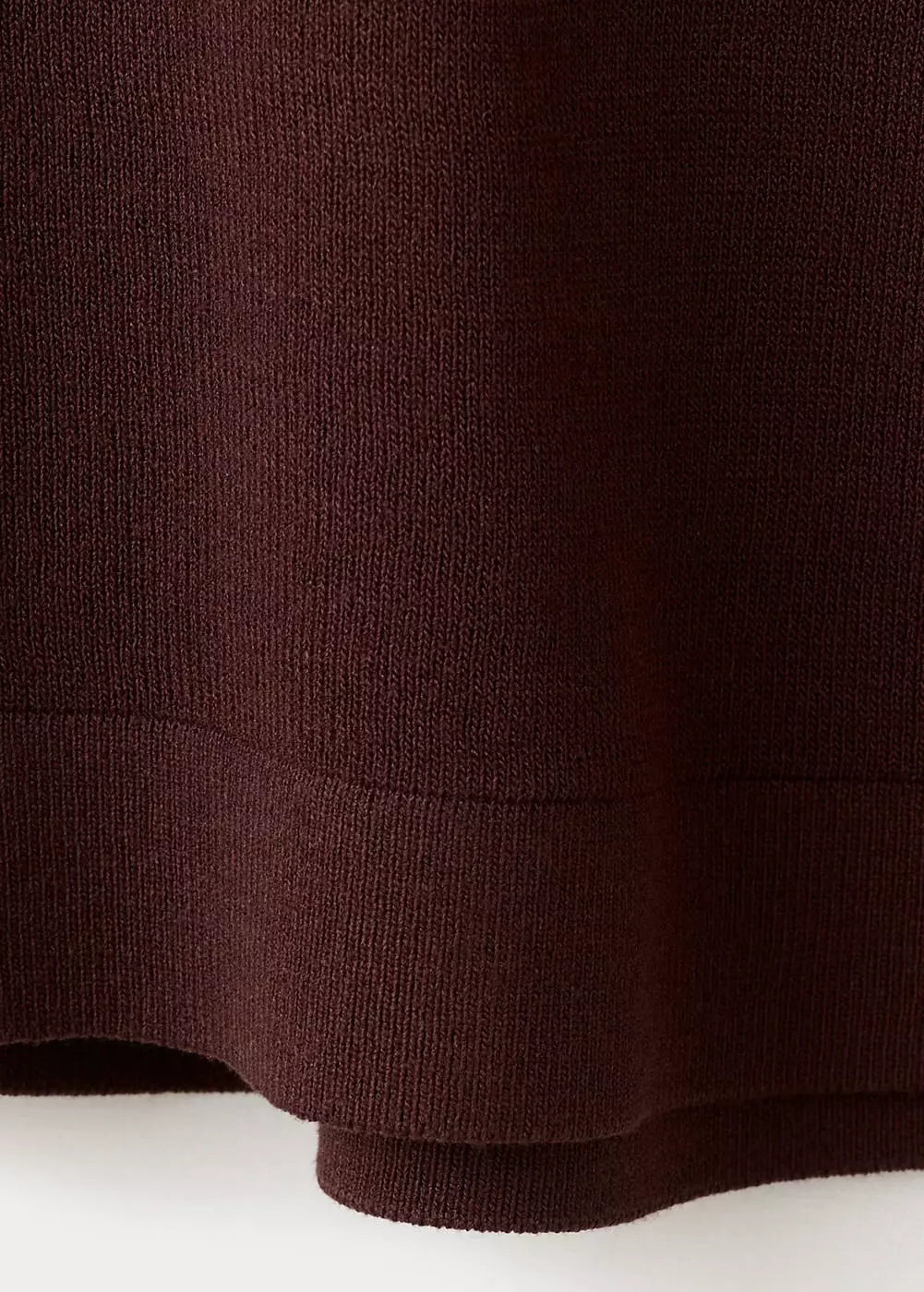 Atasan rajut dengan detail syal