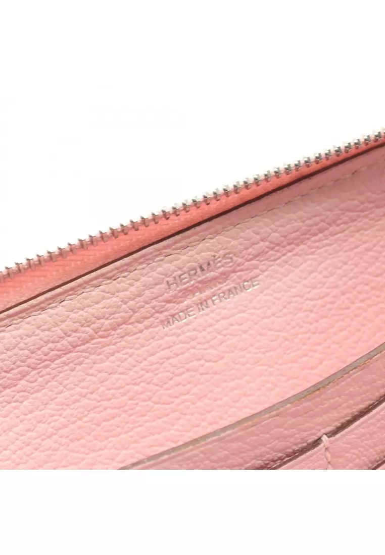Pre-Loved Hermès Azap Long rose sakura round zipper long wallet Sikkim leather Light pink silver hardware T stamp