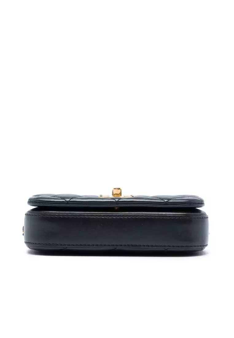 Pre-Loved Chanel Mini Quilted Calfskin Nailed Cc Flap